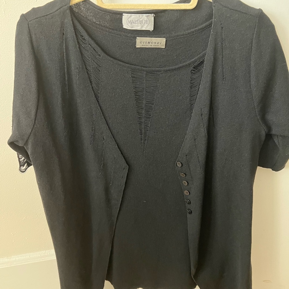 Black top with half sleeve matching jacket.  Very good condition.